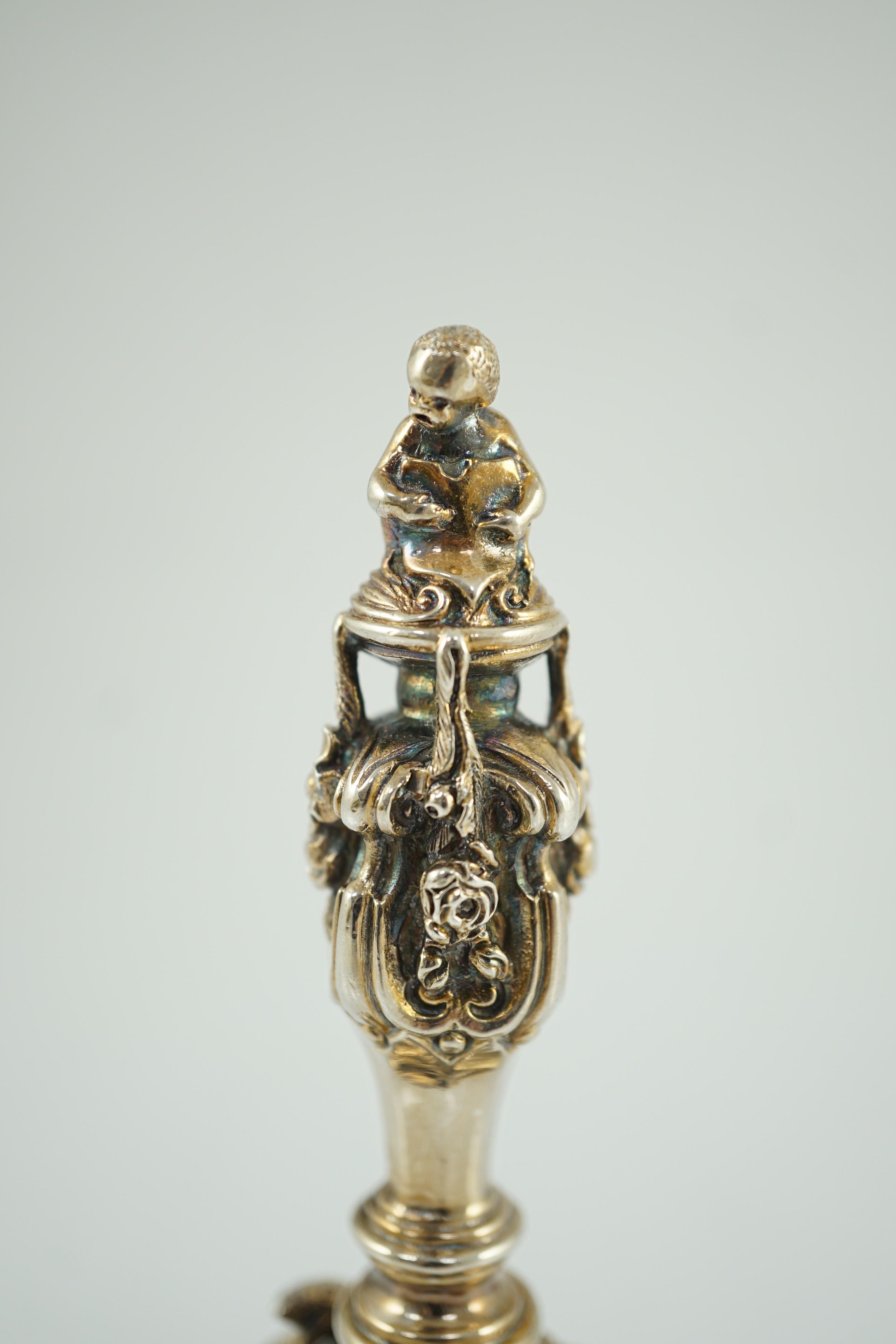 An Elizabeth II cast silver hand bell, by Garrard & Co.